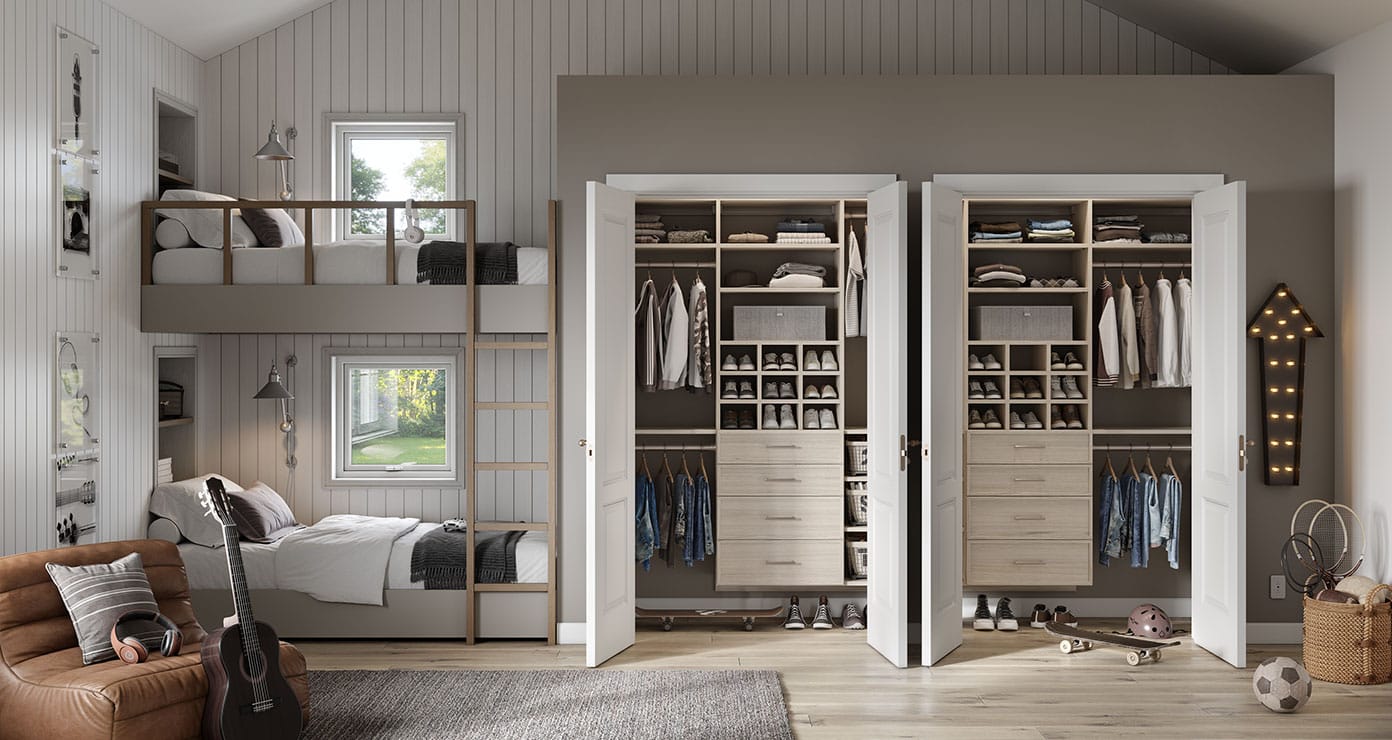 Shared bedroom dual reach in closets for boys room wardrobe storage by California Closets