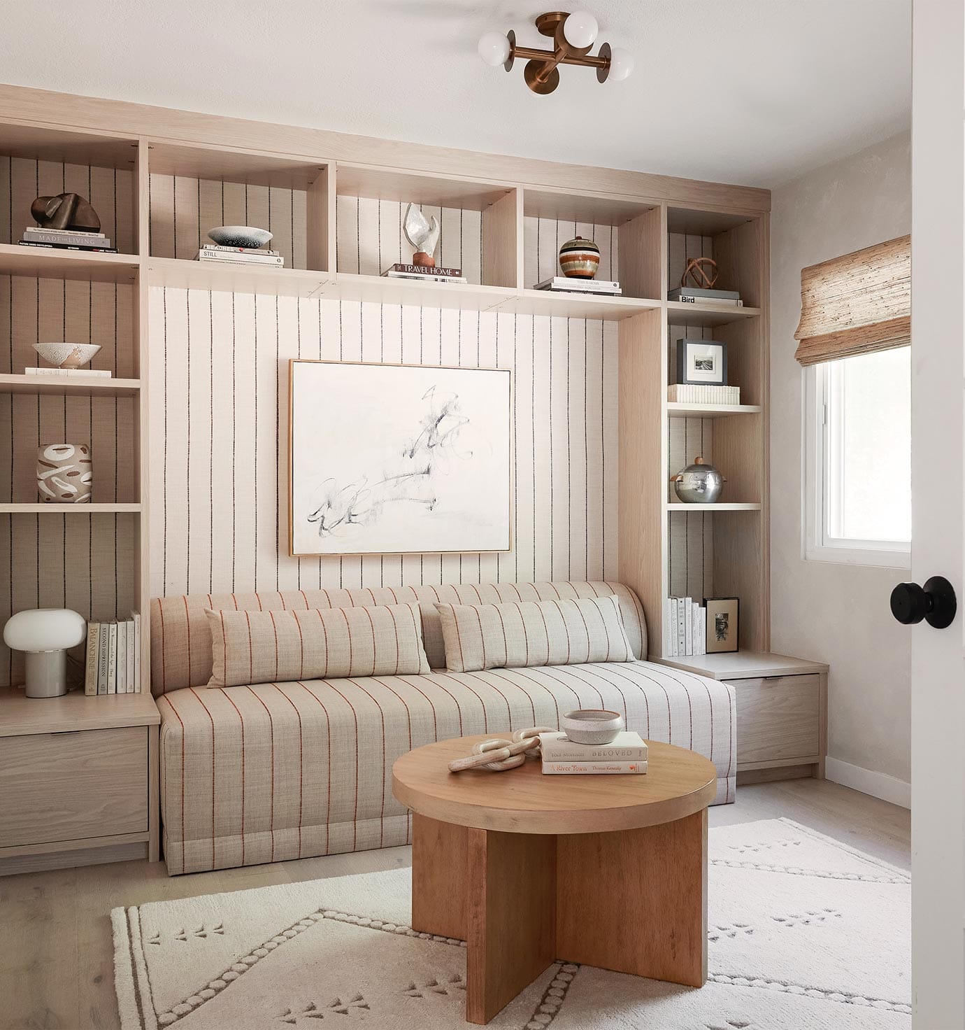 Custom closet organizing drawers and lighted shelving from California Closets