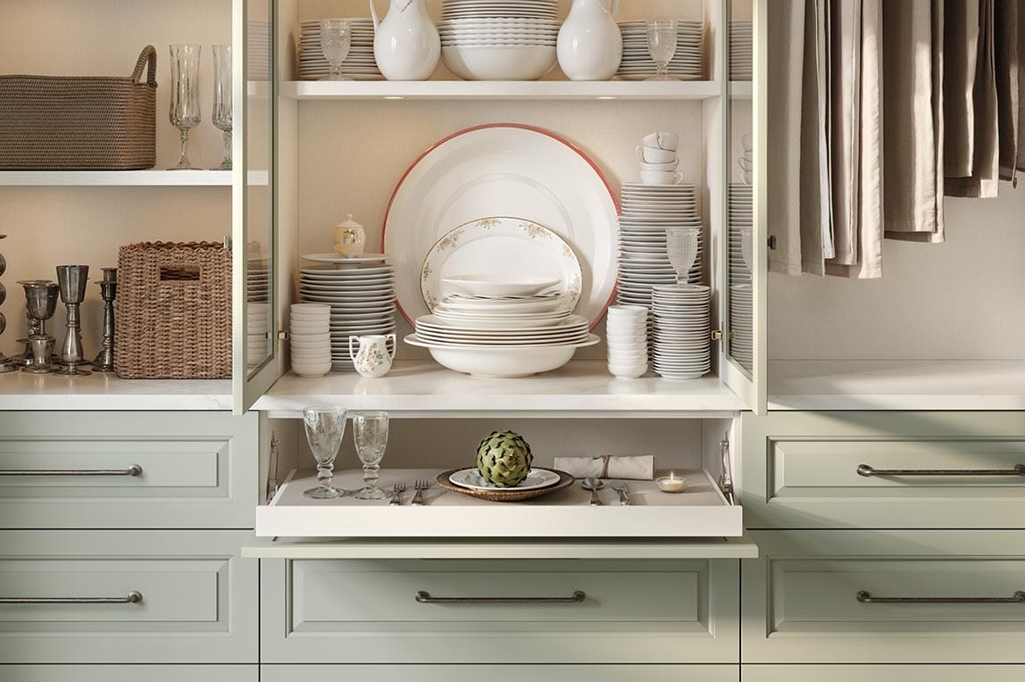 Custom open kitchen pantry design with puck lighting for storage by California Closets