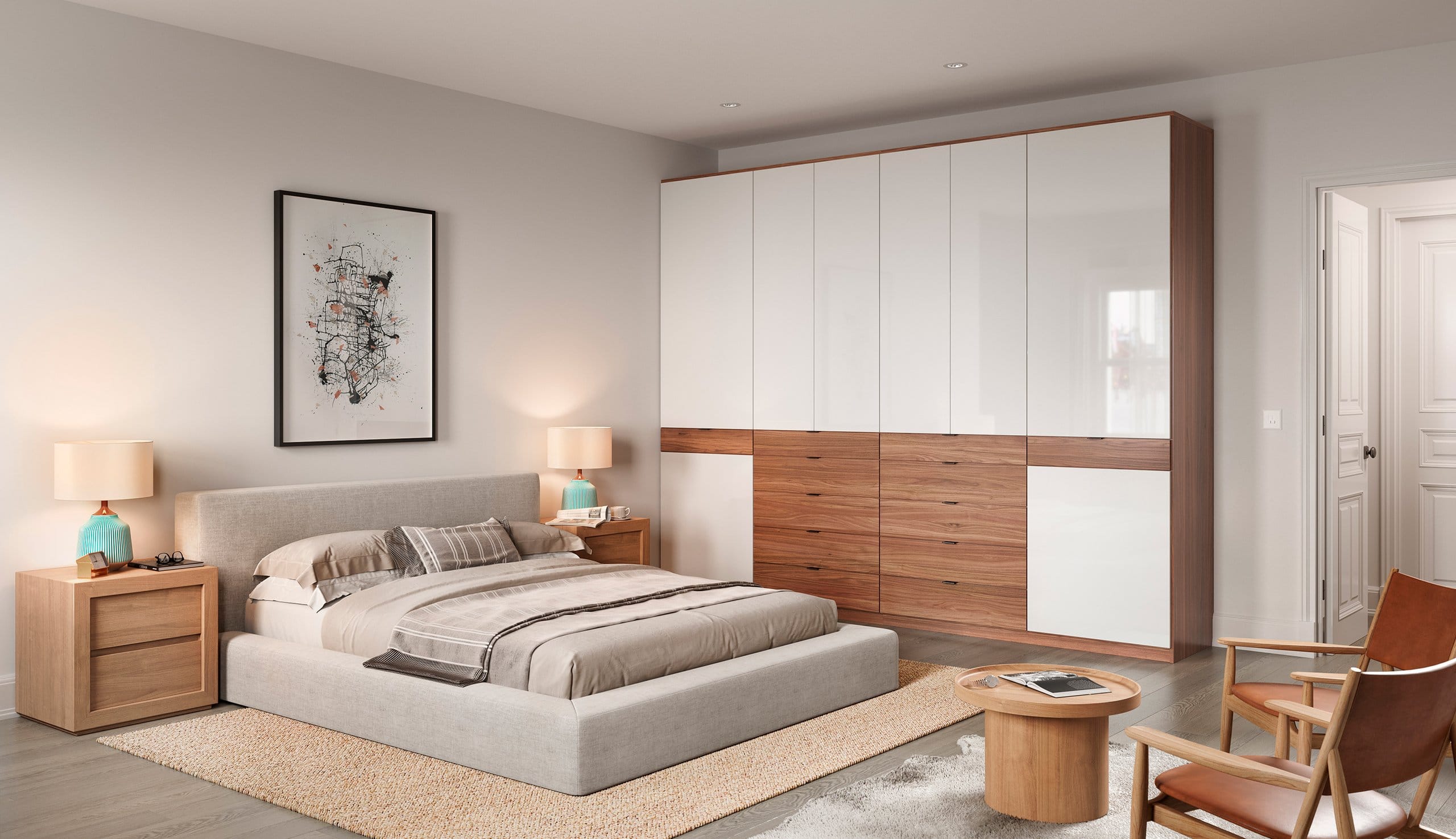 Installed closet with floor to ceiling storage cabinets and custom drawers by California Closets